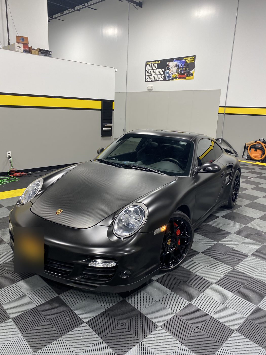 Satin black sports car finished at Tint World Sterling